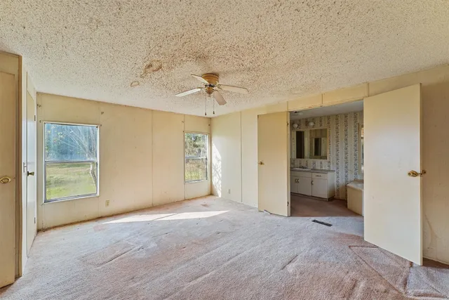 a view of a room with a sink and a window