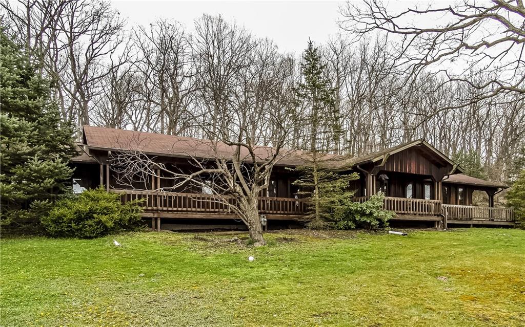 365 Rochester Road Rochester, PA 15074 - Photo 1 of 25 365 Rochester Rd with 4 acres of sweet privacy and large 3 car detached garage and extra barn just outside of Cranberry Twp!