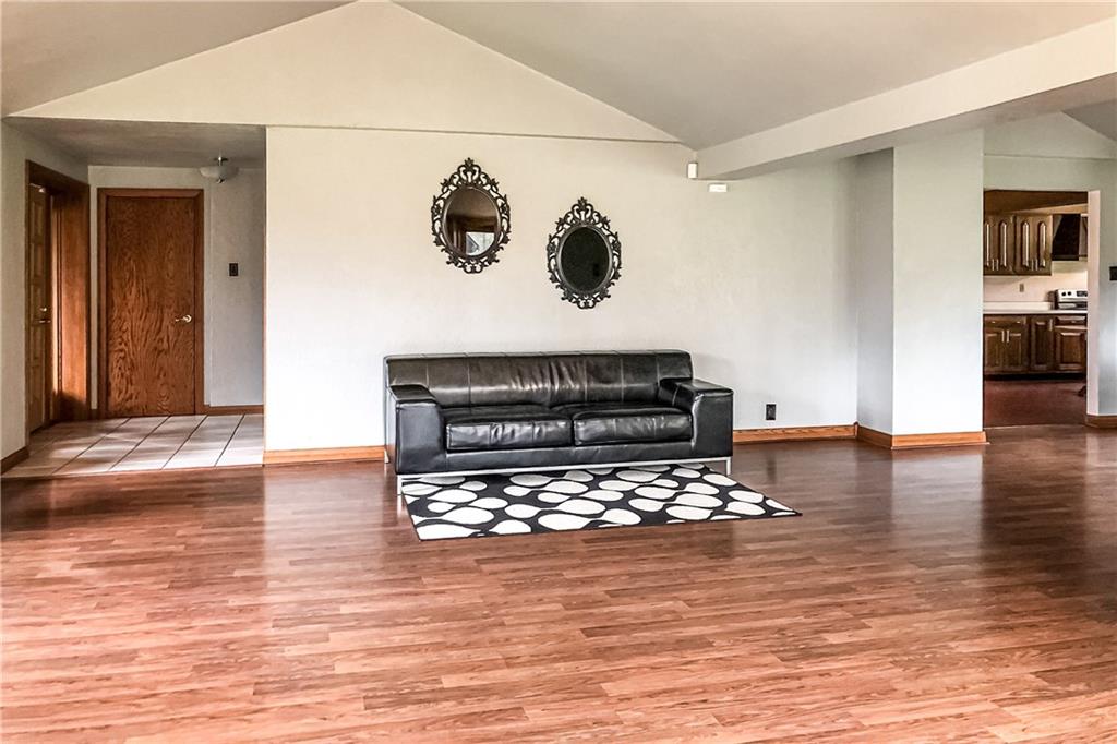 365 Rochester Road Rochester, PA 15074 - Photo 21 of 25 Ceramic tile entry flooring and solid surface in the living room and dining room.