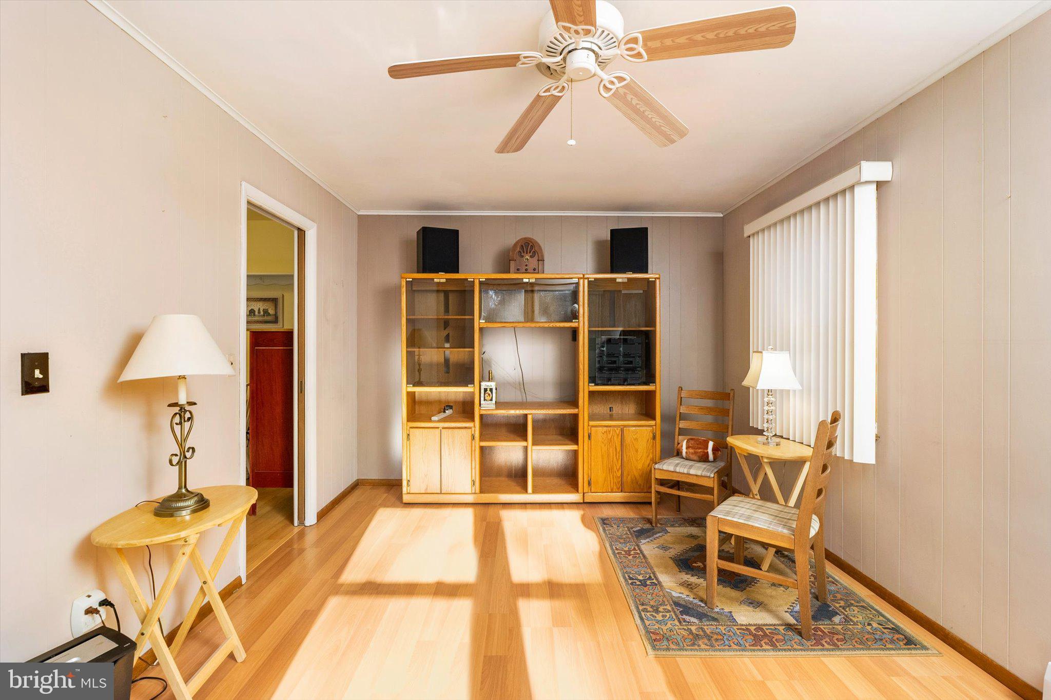 52 Castleton Drive Toms River, NJ 08757 - Photo 13 of 28 a room with furniture and a chandelier