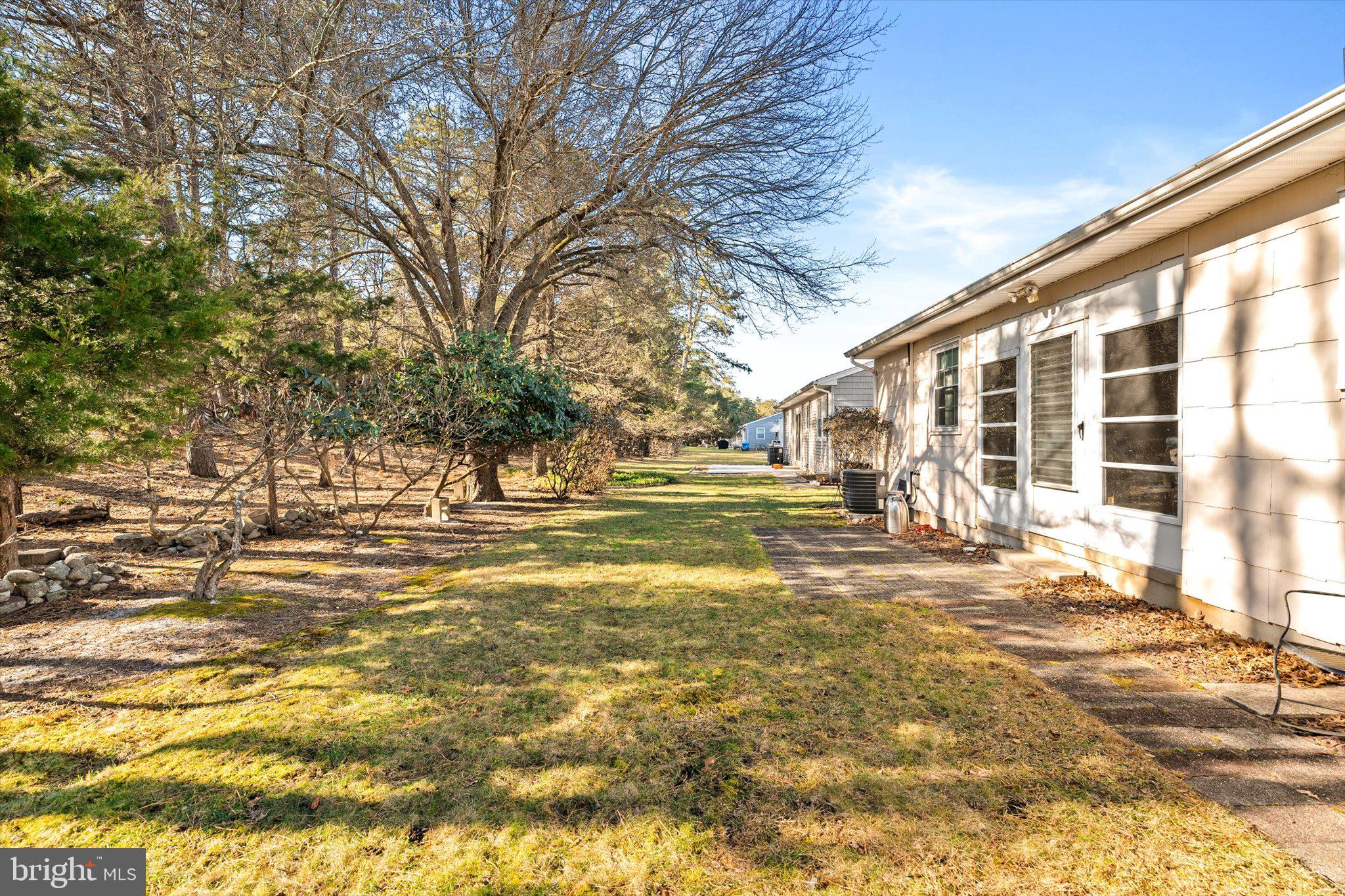 52 Castleton Drive Toms River, NJ 08757 - Photo 25 of 28 a view of road with large trees