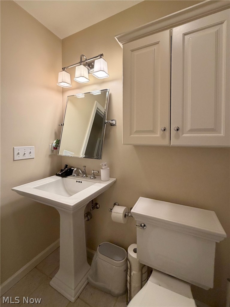 1343 Courtland Road Weirton, WV 26062 - Photo 36 of 50 Half bathroom featuring toilet and light tile patterned flooring