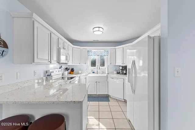 $725,000 | 312 Pine Knoll Circle, Pine Knoll Shores, NC 28512