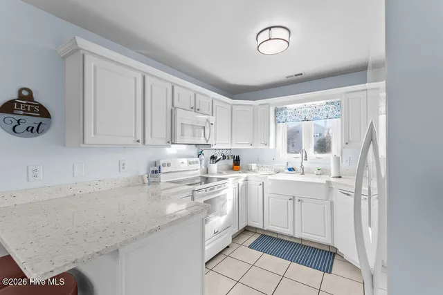 $725,000 | 312 Pine Knoll Circle, Pine Knoll Shores, NC 28512