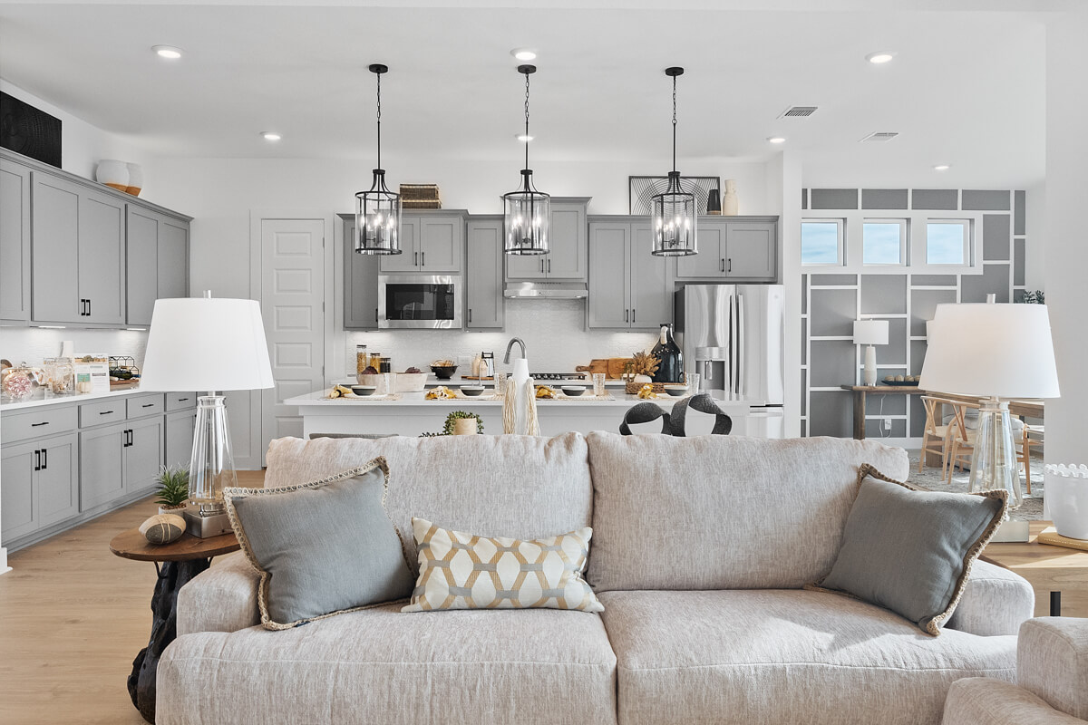 224 San Xavier Street Georgetown, TX 78633 - Photo 13 of 34 a living room with furniture and a chandelier