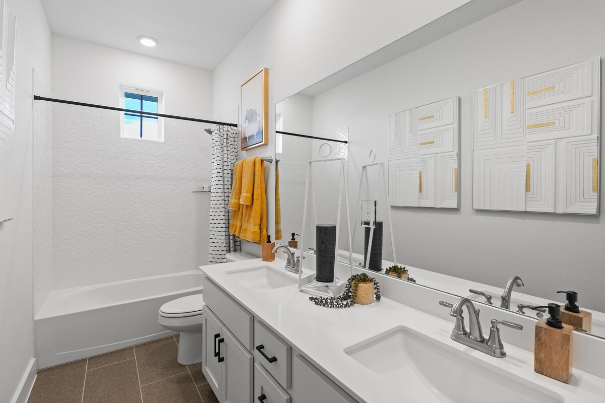 224 San Xavier Street Georgetown, TX 78633 - Photo 27 of 34 a bathroom with a sink double vanity and a mirror