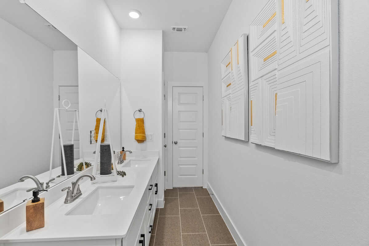 224 San Xavier Street Georgetown, TX 78633 - Photo 28 of 34 a bathroom with a sink and mirror