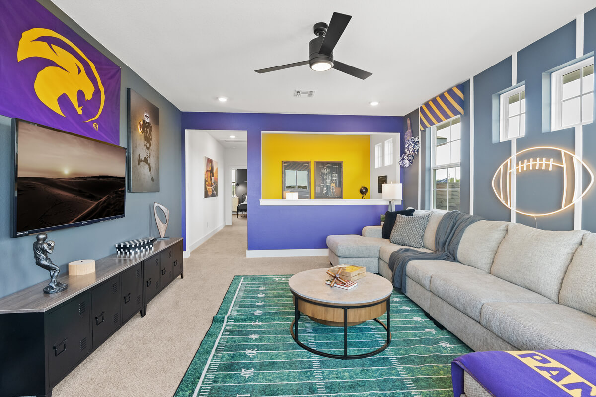 224 San Xavier Street Georgetown, TX 78633 - Photo 30 of 34 a living room with furniture and a flat screen tv