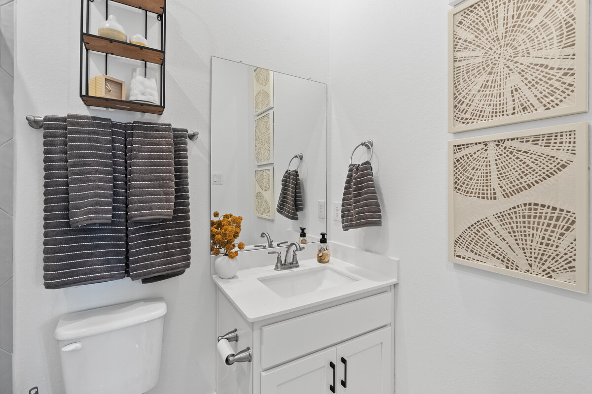 224 San Xavier Street Georgetown, TX 78633 - Photo 5 of 34 a bathroom with a sink and a mirror