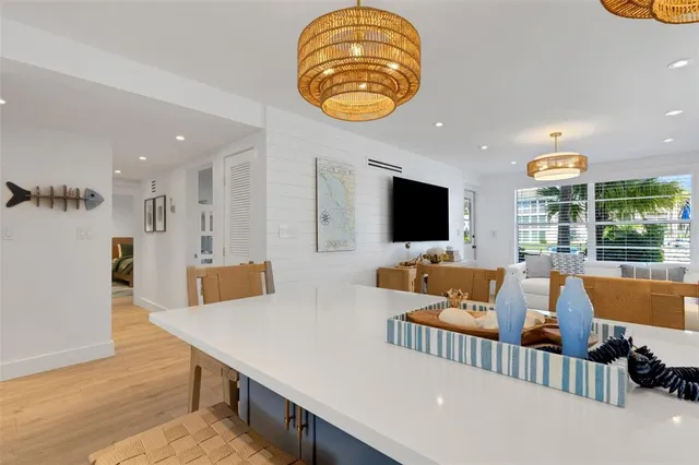 a kitchen with stainless steel appliances granite countertop a sink stove and oven