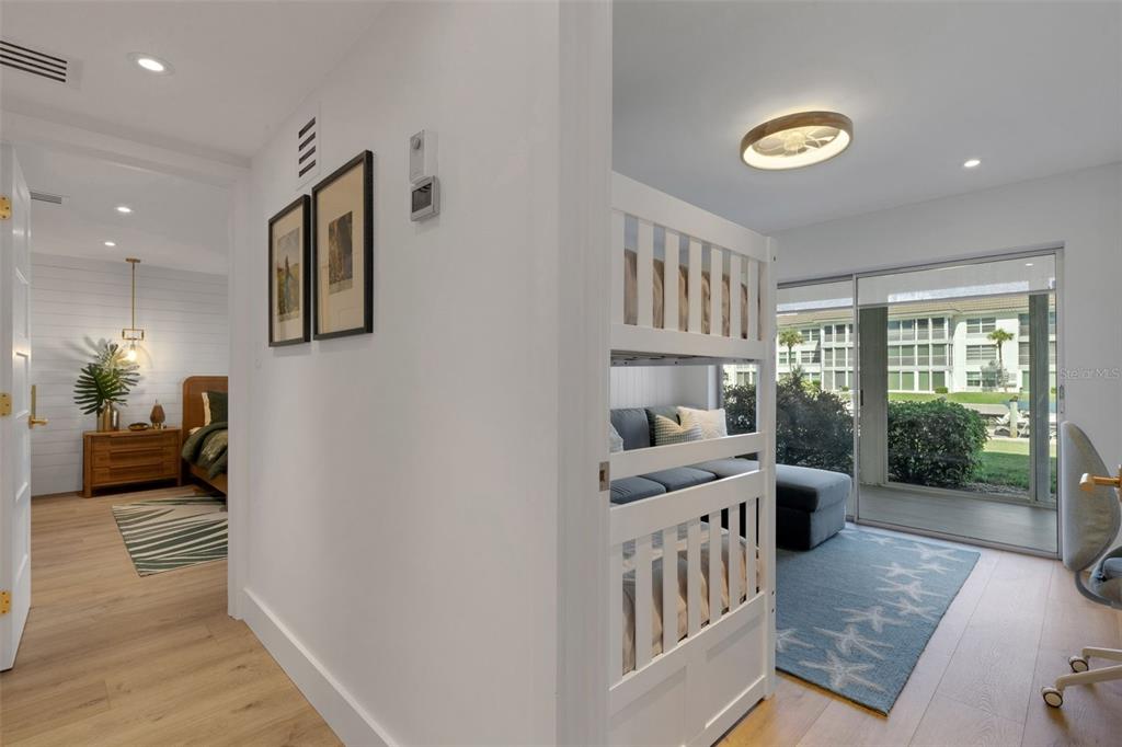 4360 Chatham Drive, Unit 108 Longboat Key, FL 34228 - Photo 22 of 56 a kitchen with a sink and a stove top oven