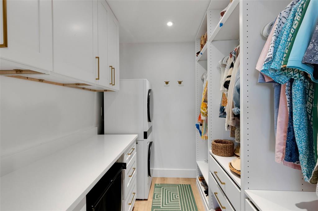 4360 Chatham Drive, Unit 108 Longboat Key, FL 34228 - Photo 31 of 56 a view of a kitchen with a sink and dishwasher