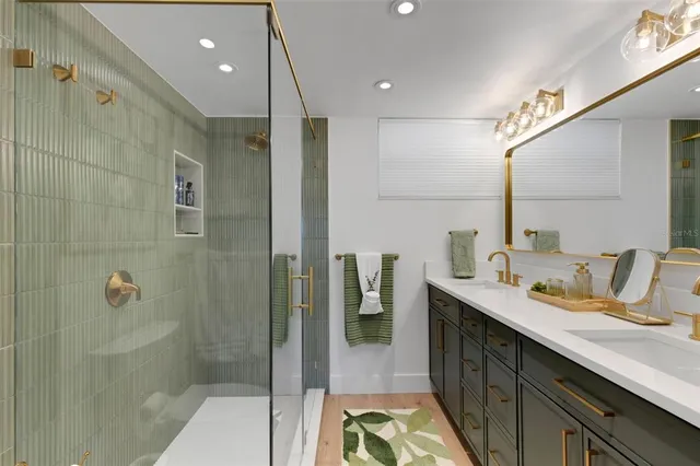 a bathroom with a shower and toilet