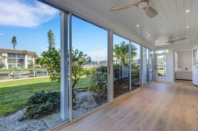a view of hallway with livingroom