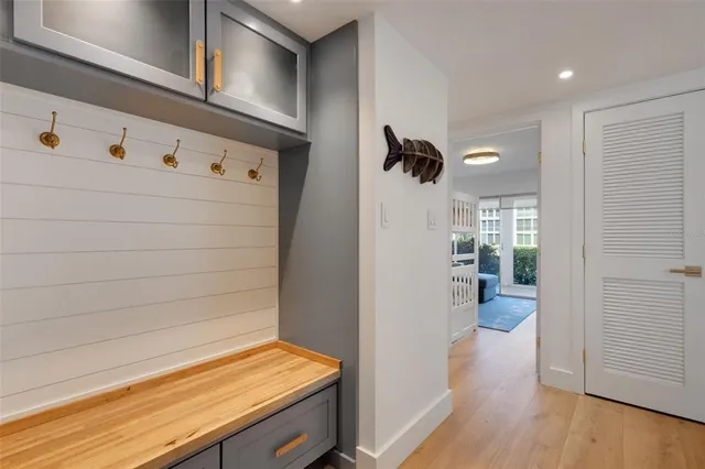 a kitchen with kitchen island granite countertop a table and chairs in it