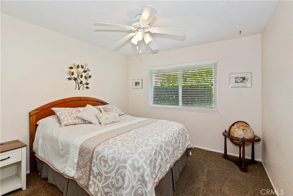 8527 Hillside Road Rancho Cucamonga, CA 91701 - Photo 23 of 50 a bedroom with a bed and a window