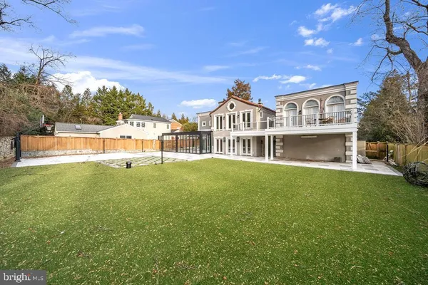 a view of a house with a big yard