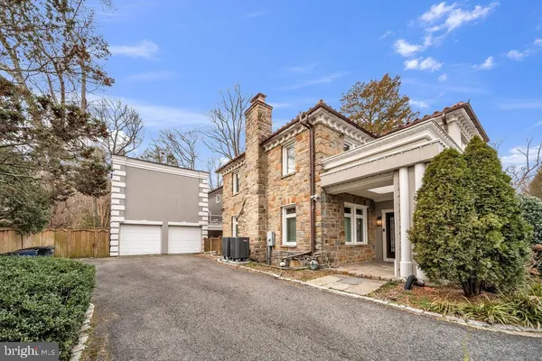 front view of a house with a street