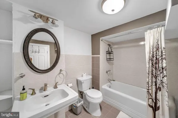 a view of a house with wooden deck