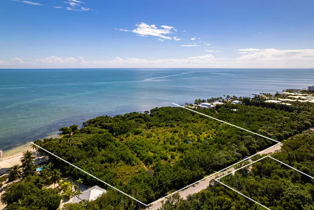 a view of a balcony with chairs