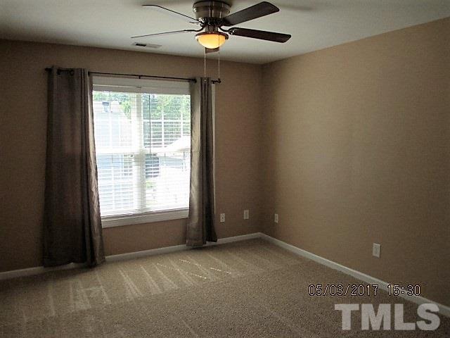 4305 Bay Rum Lane Raleigh, NC 27610 - Photo 11 of 17 a view of an empty room with a window