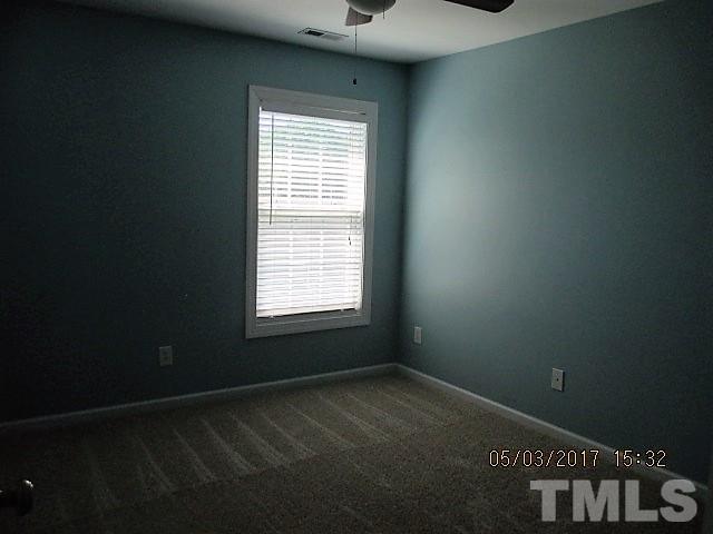 4305 Bay Rum Lane Raleigh, NC 27610 - Photo 14 of 17 a view of an empty room and window