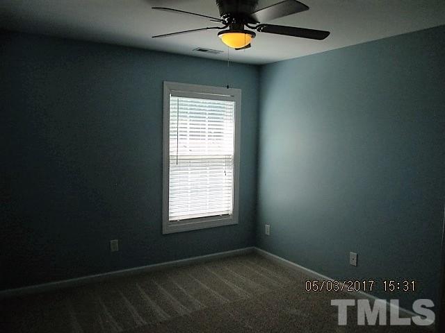 4305 Bay Rum Lane Raleigh, NC 27610 - Photo 15 of 17 a view of an empty room with a window