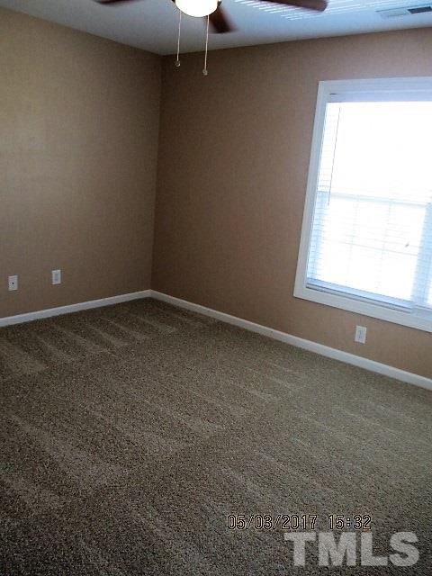 4305 Bay Rum Lane Raleigh, NC 27610 - Photo 16 of 17 an empty room with a window