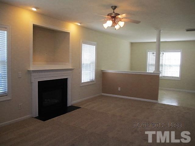 4305 Bay Rum Lane Raleigh, NC 27610 - Photo 3 of 17 a view of a livingroom with a fireplace