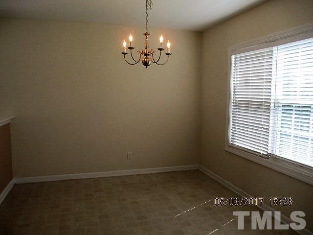 4305 Bay Rum Lane Raleigh, NC 27610 - Photo 4 of 17 a view of a chandelier in a room