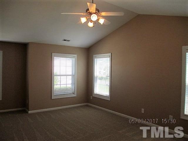 4305 Bay Rum Lane Raleigh, NC 27610 - Photo 8 of 17 a view of an empty room with a window