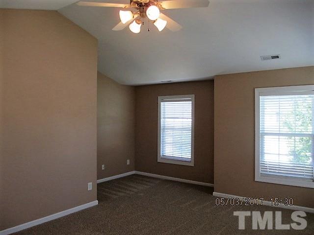 4305 Bay Rum Lane Raleigh, NC 27610 - Photo 9 of 17 an empty room with a window