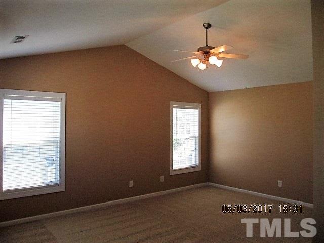 4305 Bay Rum Lane Raleigh, NC 27610 - Photo 10 of 17 a view of an empty room with a window