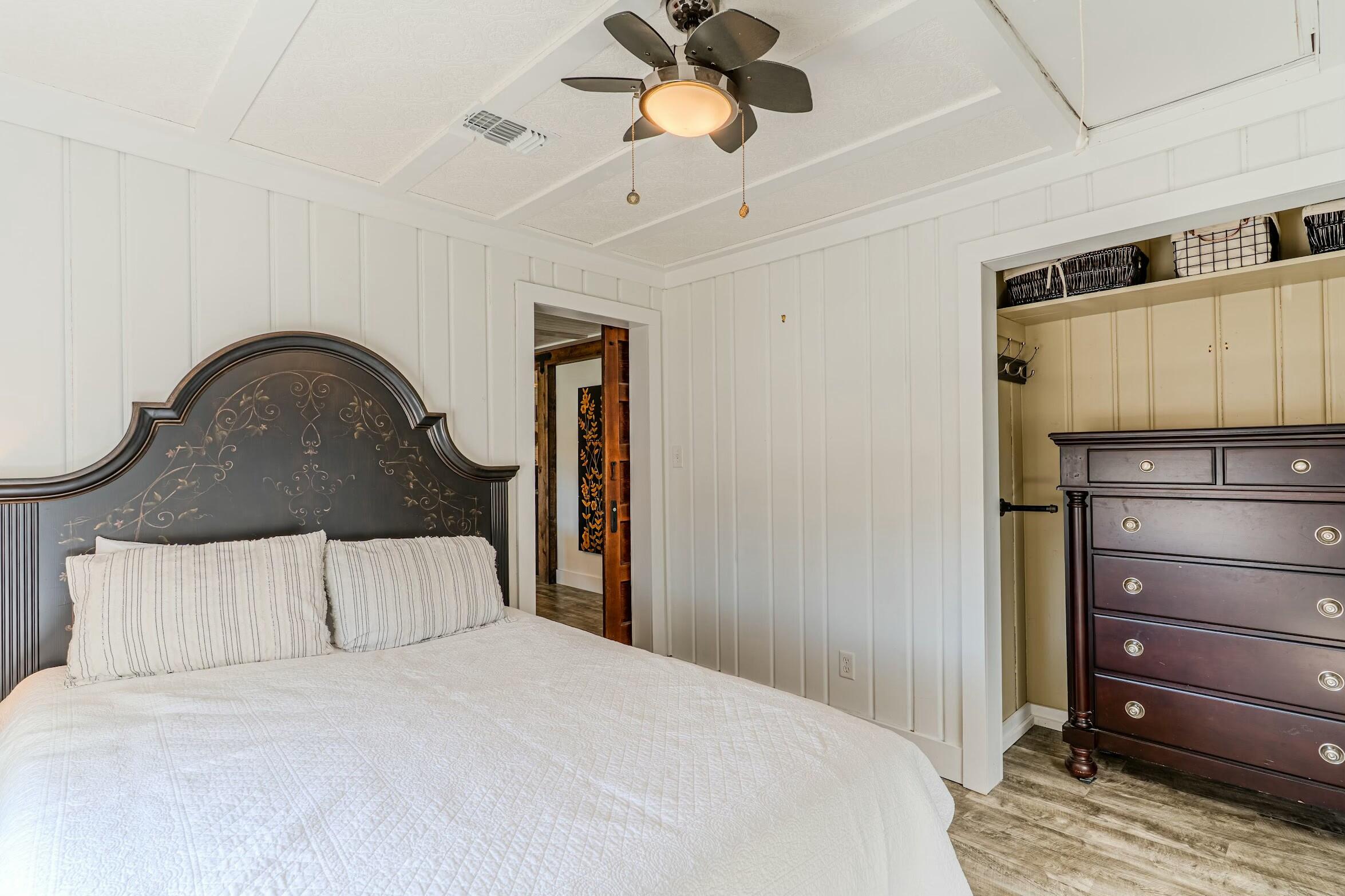 175 Ruth Road Freeport, FL 32439 - Photo 13 of 69 a bedroom with a bed and a dresser