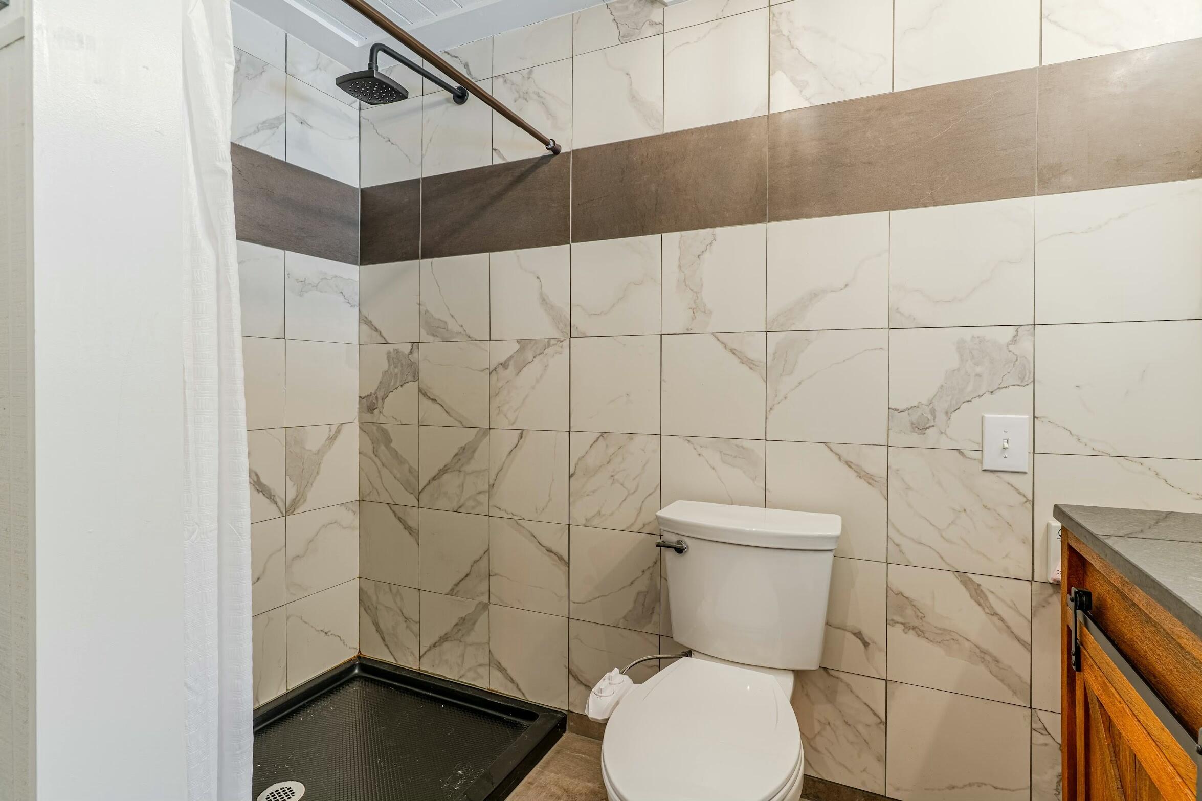 175 Ruth Road Freeport, FL 32439 - Photo 19 of 69 a bathroom with a toilet and a shower