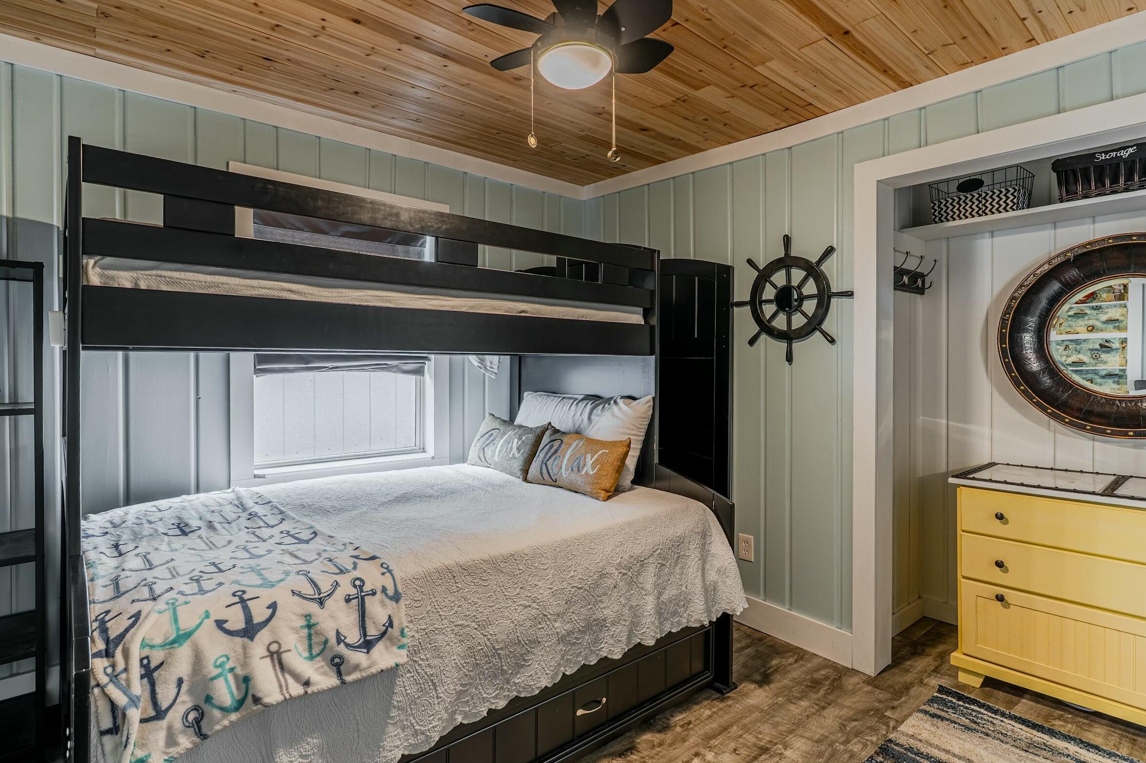 175 Ruth Road Freeport, FL 32439 - Photo 21 of 69 a bedroom with a bed and a mirror