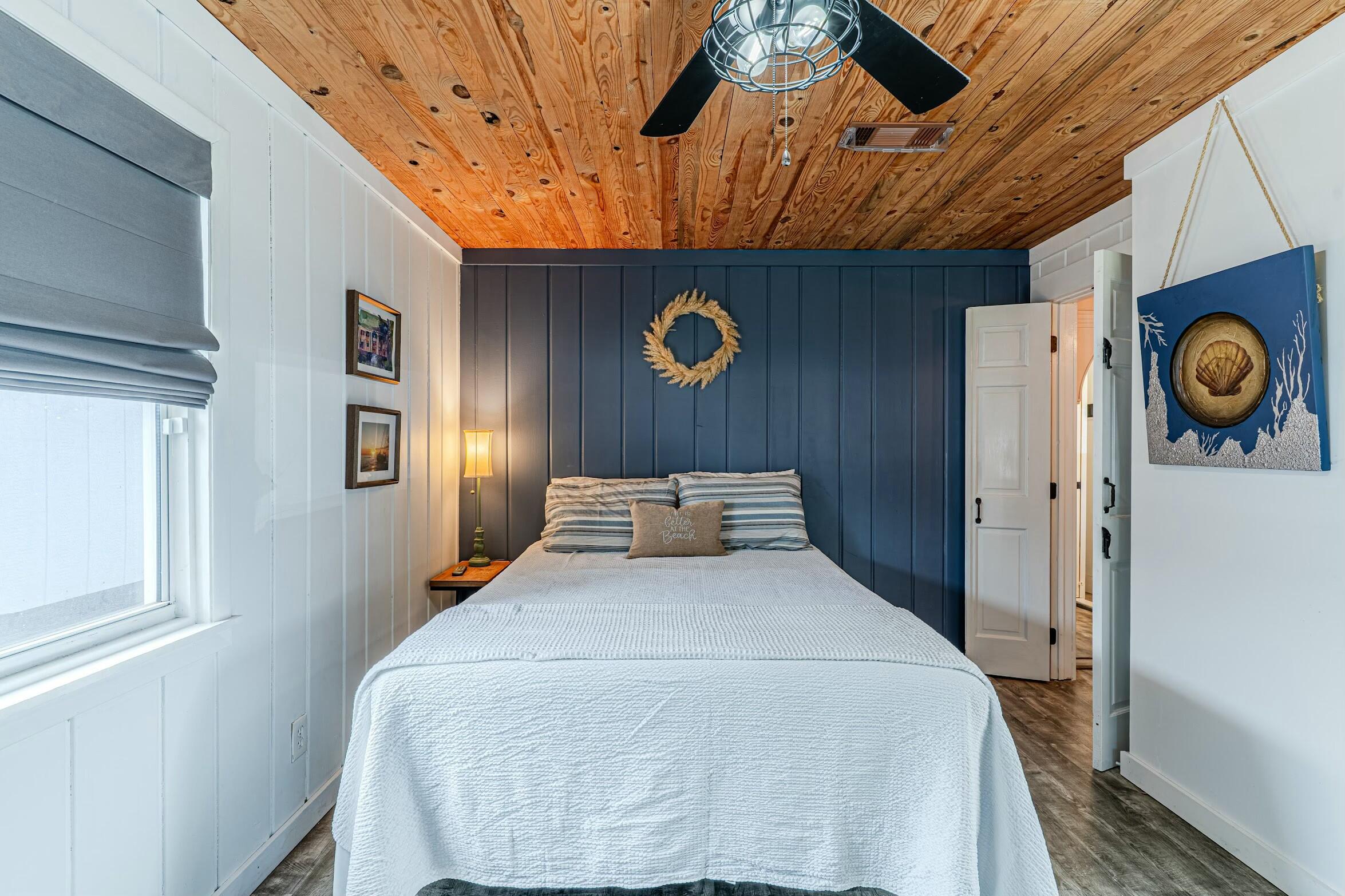 175 Ruth Road Freeport, FL 32439 - Photo 24 of 69 a bedroom with a bed and a window