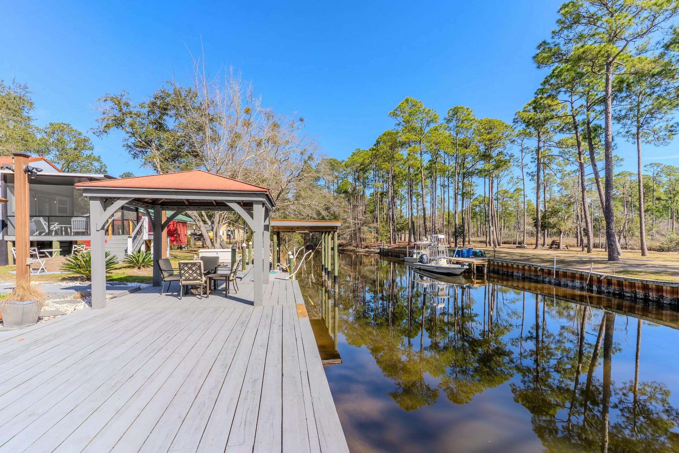 175 Ruth Road Freeport, FL 32439 - Photo 45 of 69 a view of a swimming pool with a patio