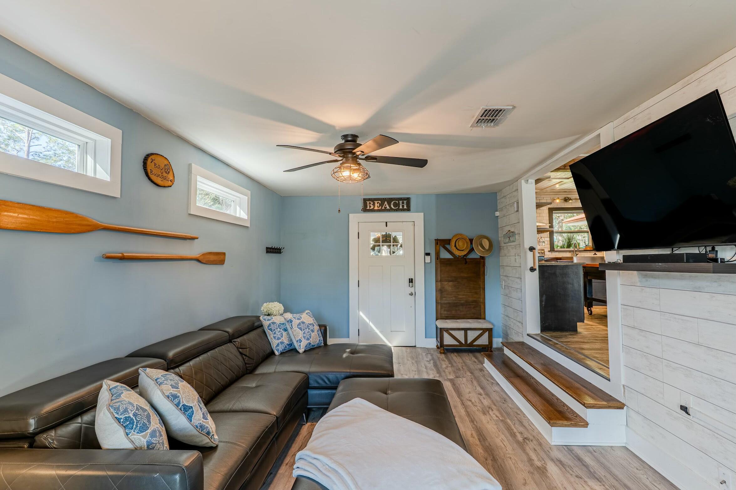 175 Ruth Road Freeport, FL 32439 - Photo 5 of 69 a living room with furniture and a flat screen tv