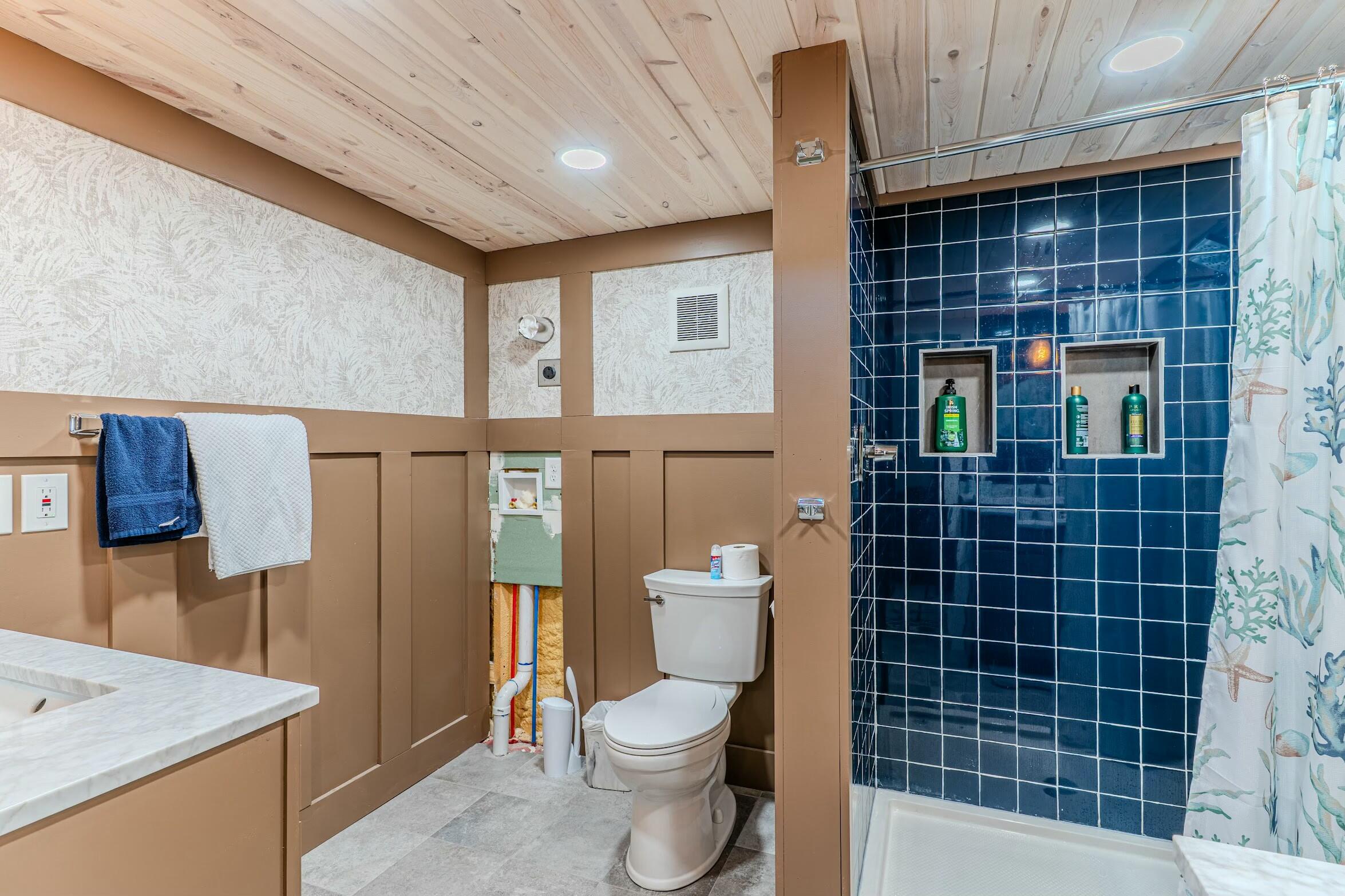 175 Ruth Road Freeport, FL 32439 - Photo 54 of 69 a bathroom with a toilet a sink and shower