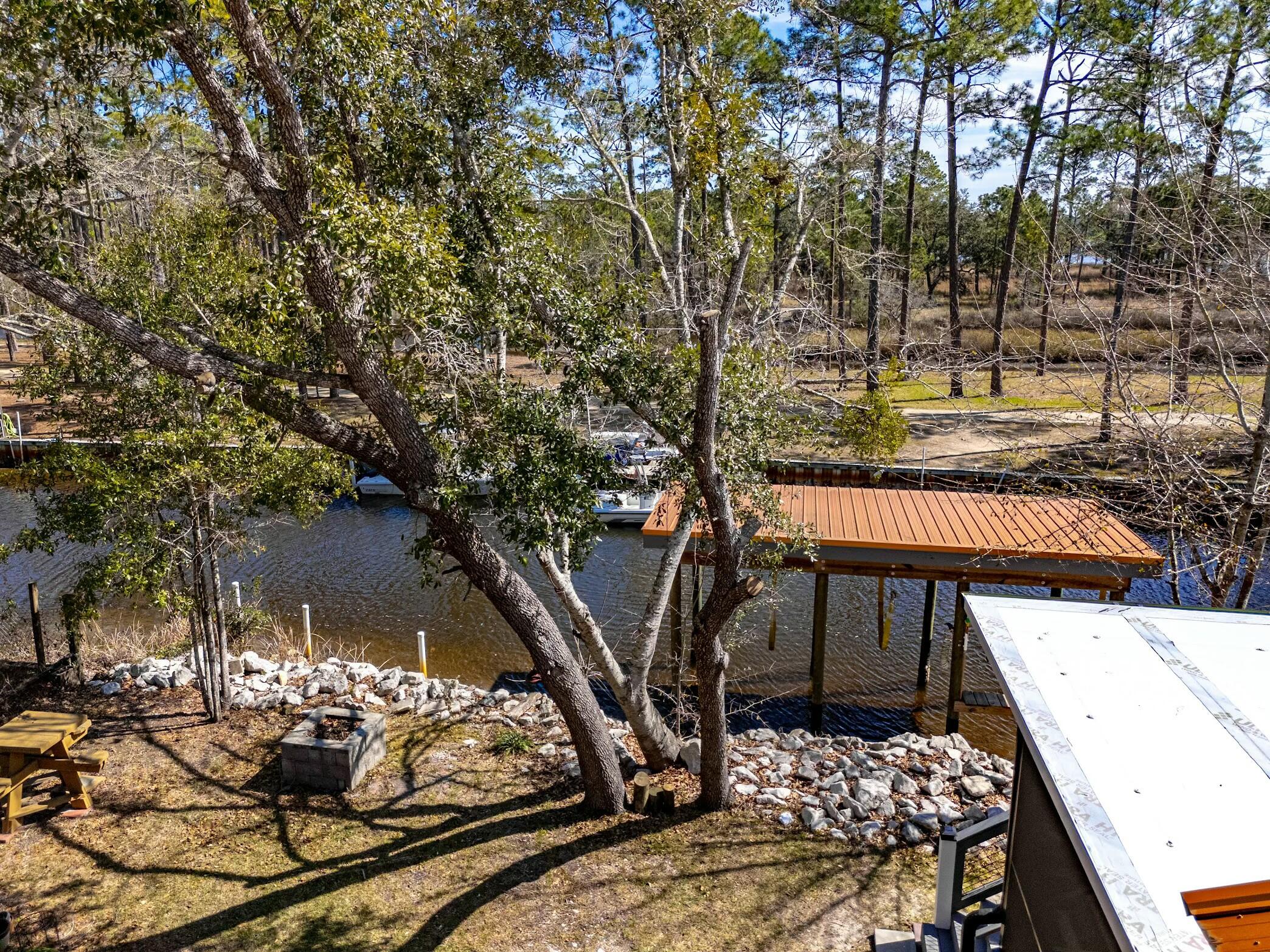 175 Ruth Road Freeport, FL 32439 - Photo 65 of 69 a view of a chairs and table in the patio
