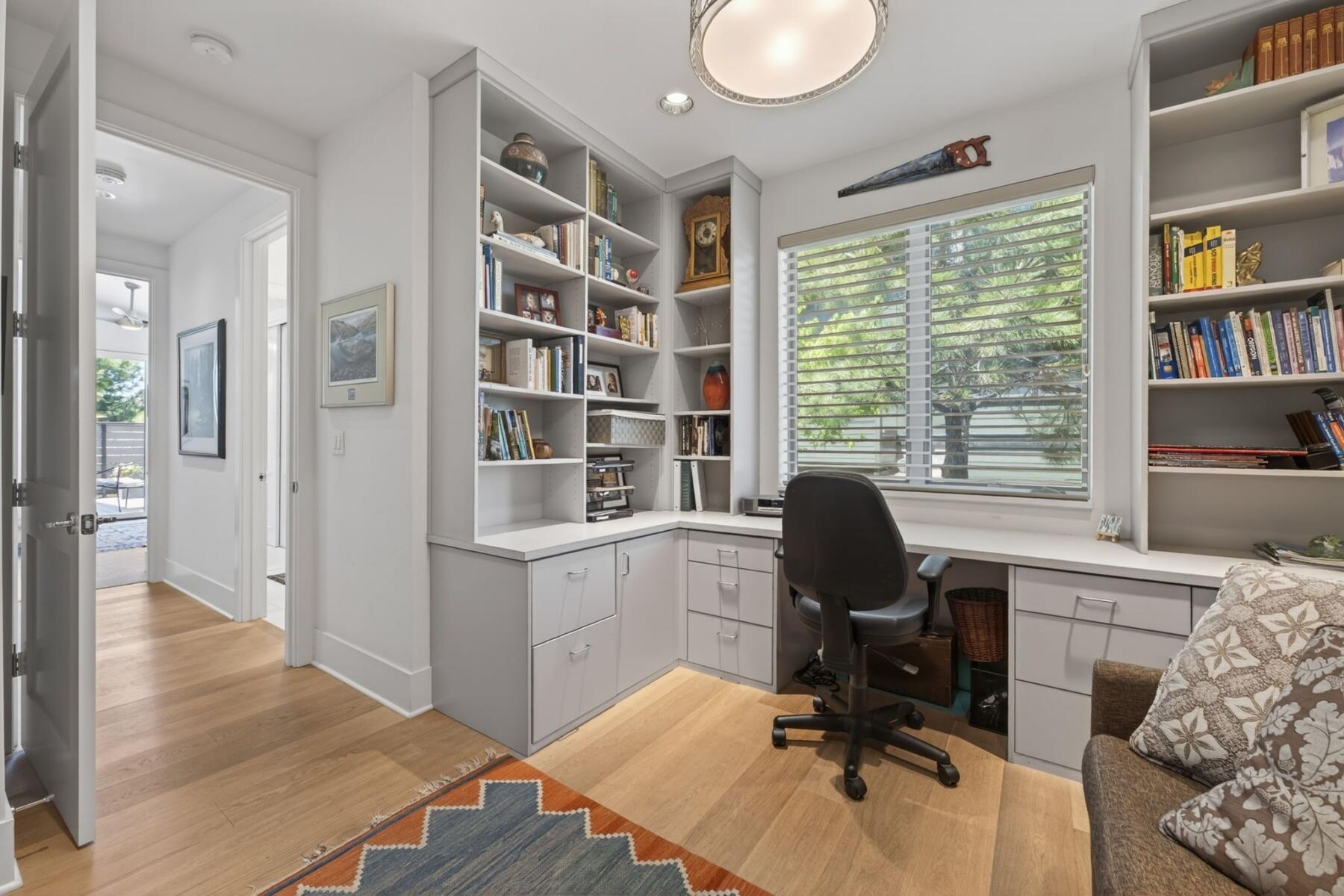 61487 Hackleman Court Bend, OR 97702 - Photo 31 of 35 a view of a workspace with furniture and a window