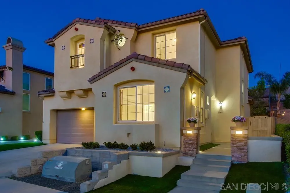 13477 Sydney Rae Place San Diego, CA 92129 - Photo 1 of 73 a front view of a house with a yard