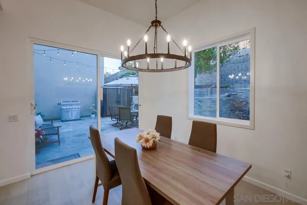 13477 Sydney Rae Place San Diego, CA 92129 - Photo 16 of 73 a view of a dining room with furniture window and outside view