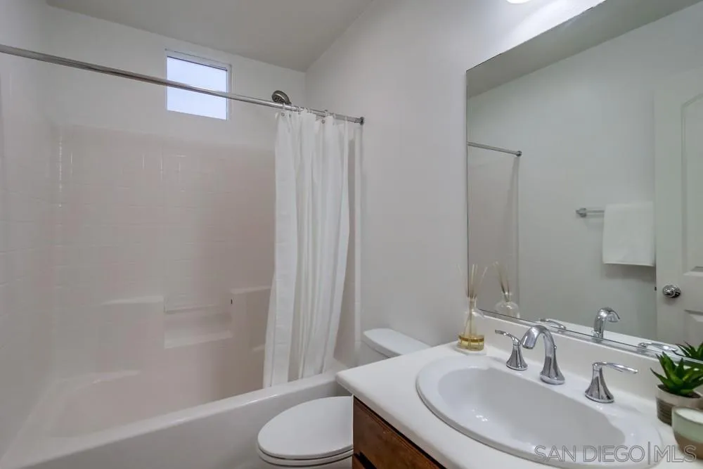 13477 Sydney Rae Place San Diego, CA 92129 - Photo 21 of 73 a bathroom with a sink toilet and shower