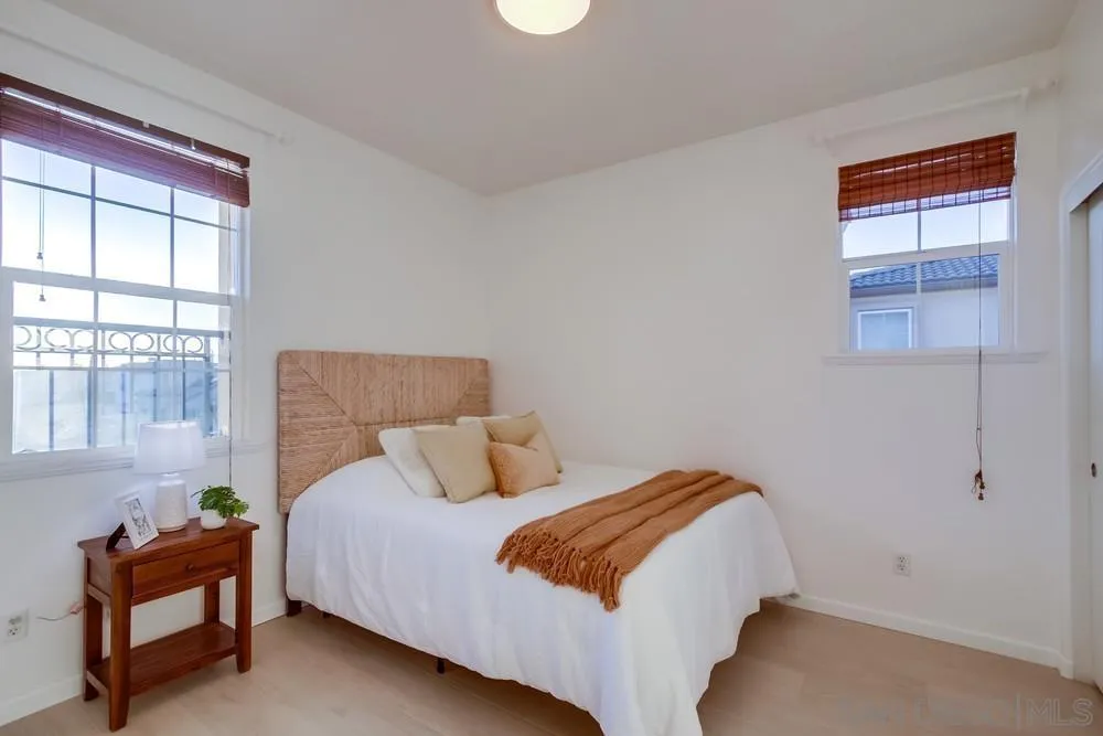 13477 Sydney Rae Place San Diego, CA 92129 - Photo 29 of 73 a bedroom with bed and window