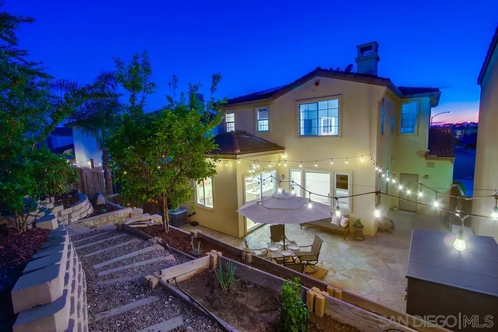13477 Sydney Rae Place San Diego, CA 92129 - Photo 46 of 73 a front view of a house with yard