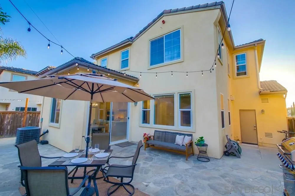 13477 Sydney Rae Place San Diego, CA 92129 - Photo 59 of 73 a view of a dinning table and chairs in the patio