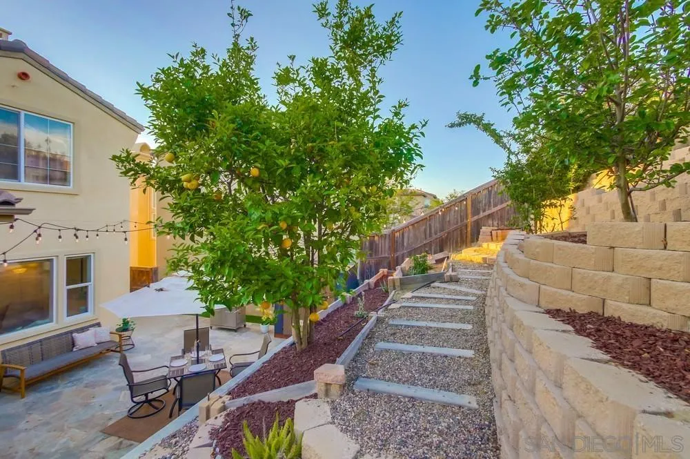 13477 Sydney Rae Place San Diego, CA 92129 - Photo 60 of 73 a view of house with outdoor space and seating area
