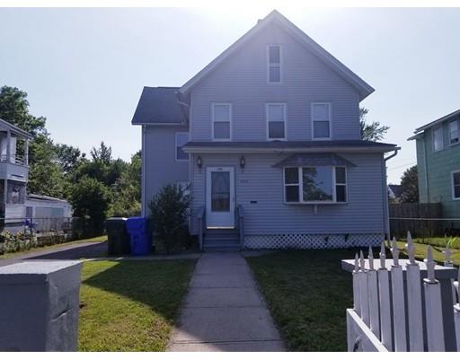 346 Eastern Avenue Springfield, MA 01109 - Photo 2 of 5 a front view of a house with a garden
